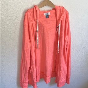 Neon pink zip-up sweater